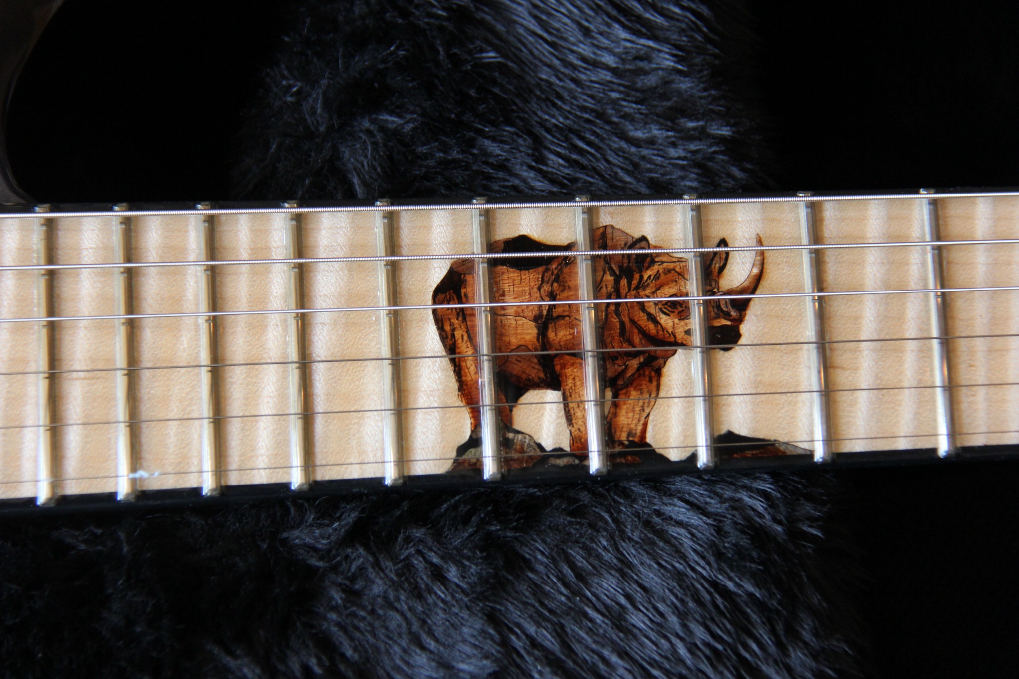 Rhino fingerboard inlay